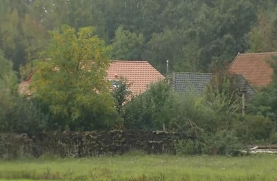 The small group of buildings after a family group were discovered to be living in secluded conditions in Ruinerwold, 130 kilometers (80 miles) northeast of Amsterdam, Netherlands, Tuesday Oct. 15, 2019. Dutch authorities were Tuesday trying to piece together the story of a six-member family group believed to have lived for nine years on a farm, isolated from the outside world in the rural east of the Netherlands. (RTL Netherlands via AP)