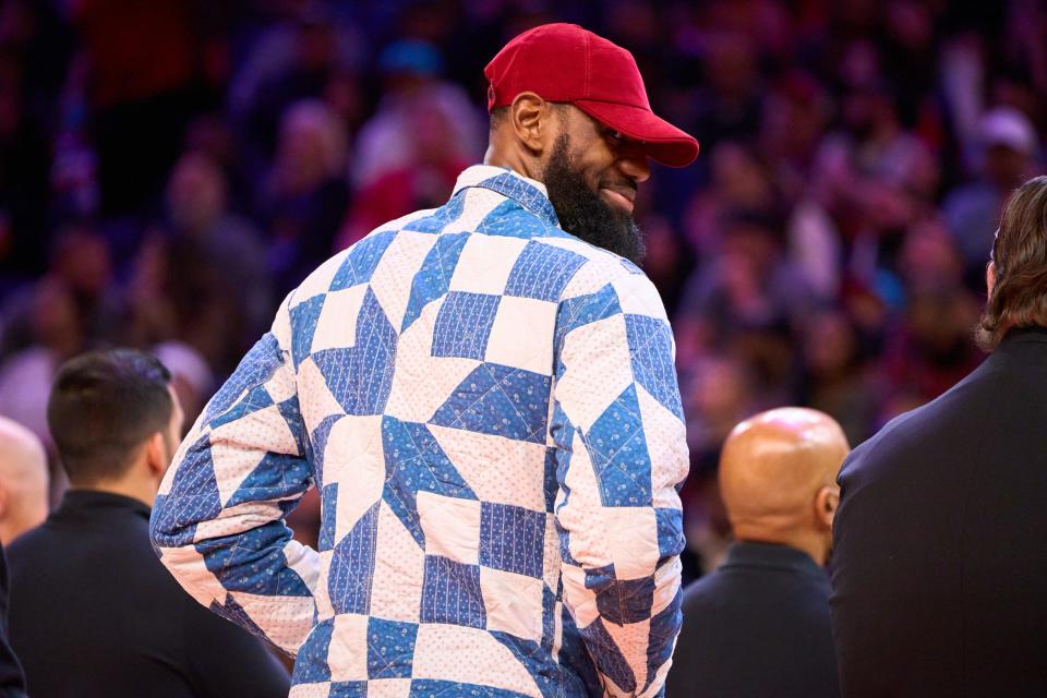 Dec 19, 2022; Phoenix, AZ, USA; Los Angeles Lakers LeBron James looks out to the crowd as he joins his team huddle during a timeout against the Phoenix Suns at Footprint Center on Monday, Dec. 19, 2022. Mandatory Credit: Alex Gould/The Republic