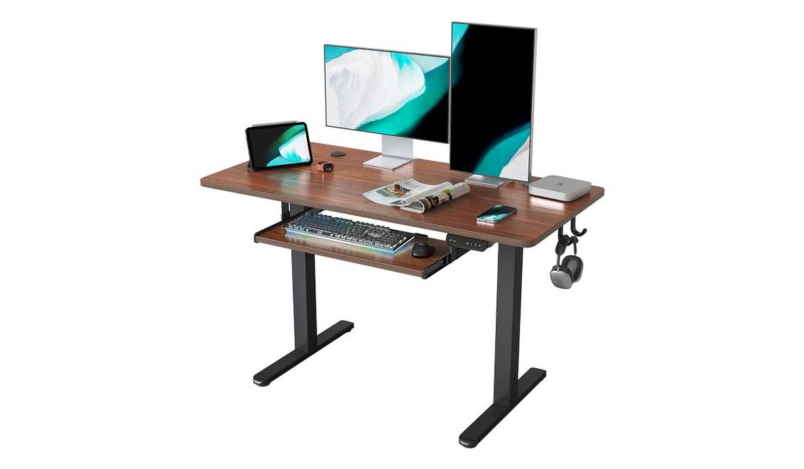 This desk’s keyboard tray features smooth gliding tracks for quick, convenient access.