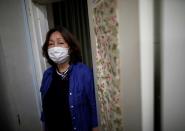 Machiko Nakayama, director of the Tokyo Befrienders call center poses for a photograph during the spread of the coronavirus disease (COVID-19), in Tokyo