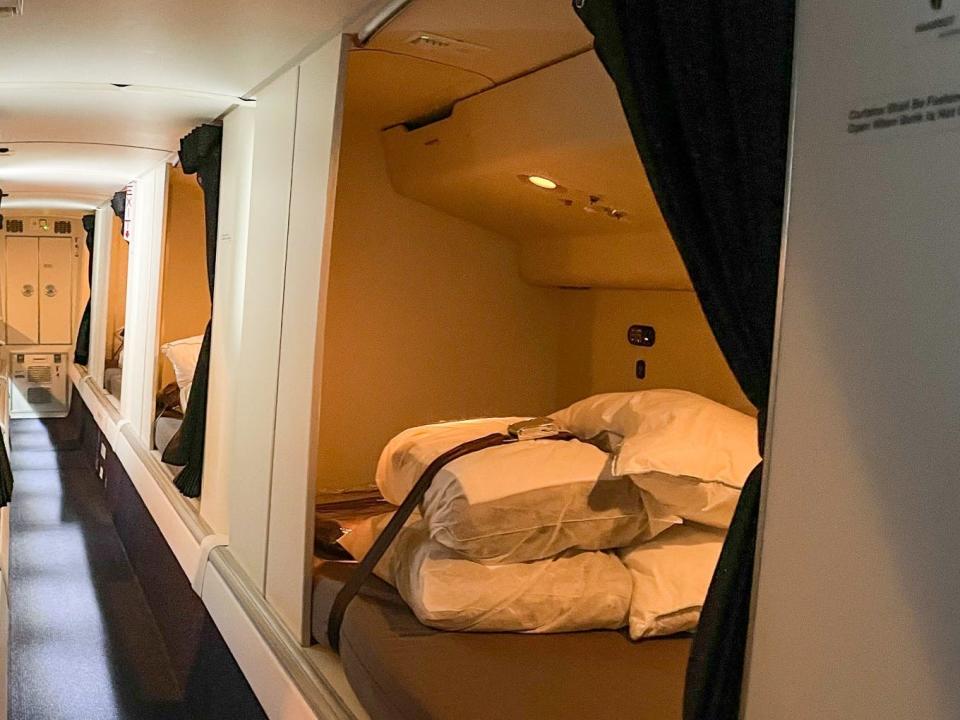 Behind the entrance are eight beds for the flight attendants.
