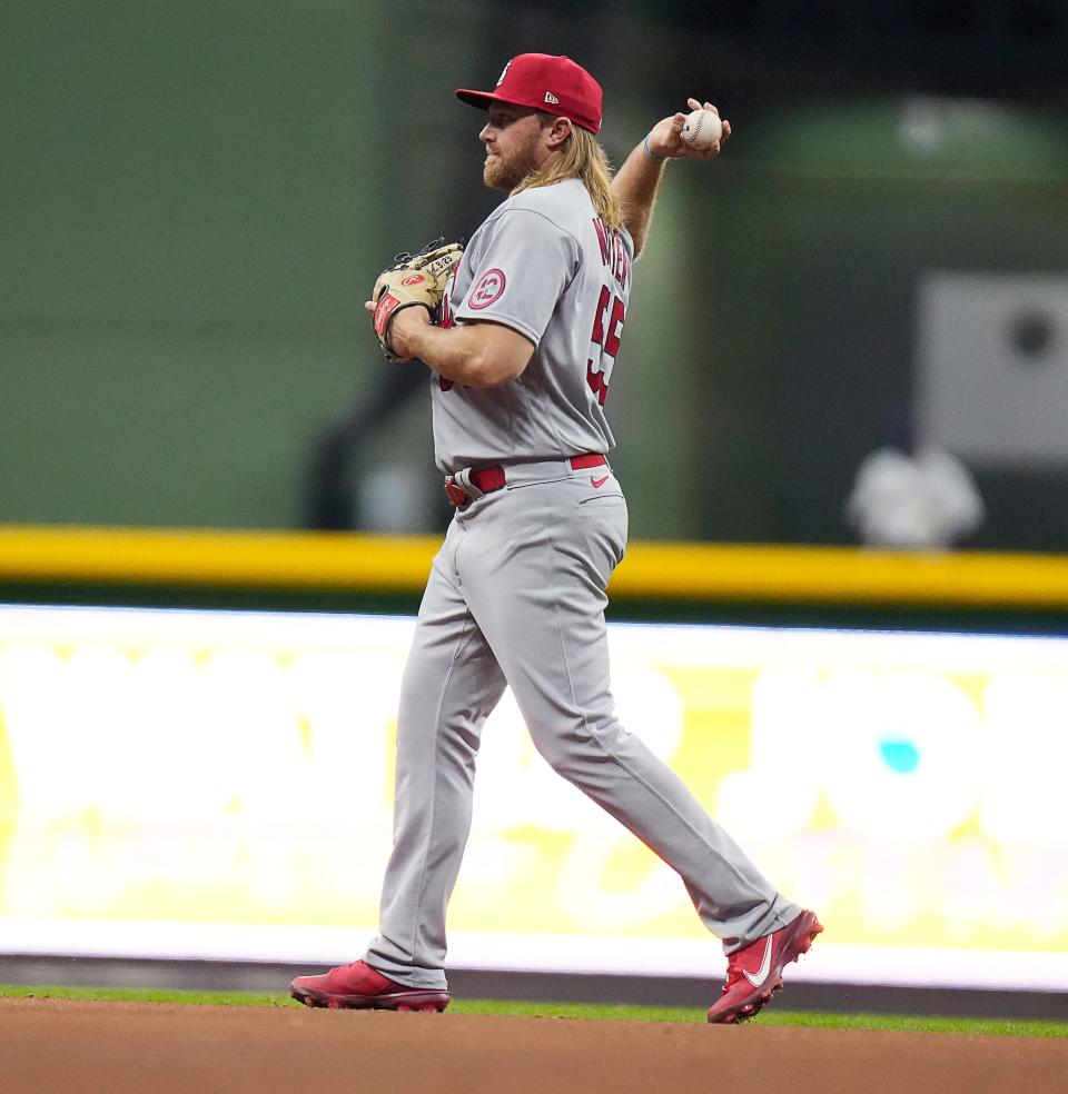 St. Louis Cardinals third baseman Taylor Motter (55) throws to the pitcher during the sixth inning of the game against the Milwaukee Brewers at American Family Field on Saturday April 8, 2023 in Milwaukee, Wis.