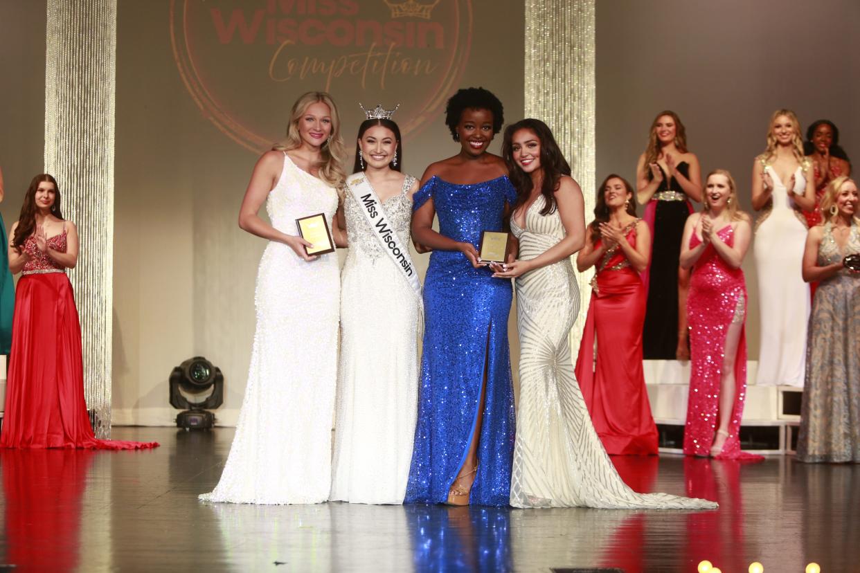 Reigning Miss Wisconsin Lila Szyryj (second from left) posing with preliminary winners (from left) Miss Northern Lights Mandi Genord (Talent), Miss Great Lakes Willow Newell and Miss Racine Christel Rivera (Evening Wear).