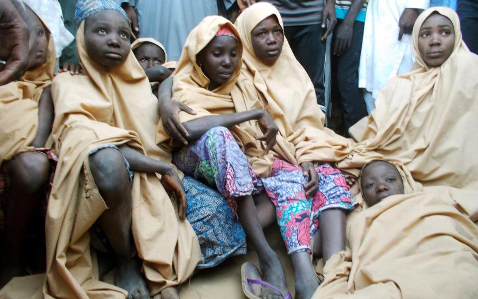 Some of the newly-released Dapchi schoolgirls pictured in Jumbam village - REUTERS