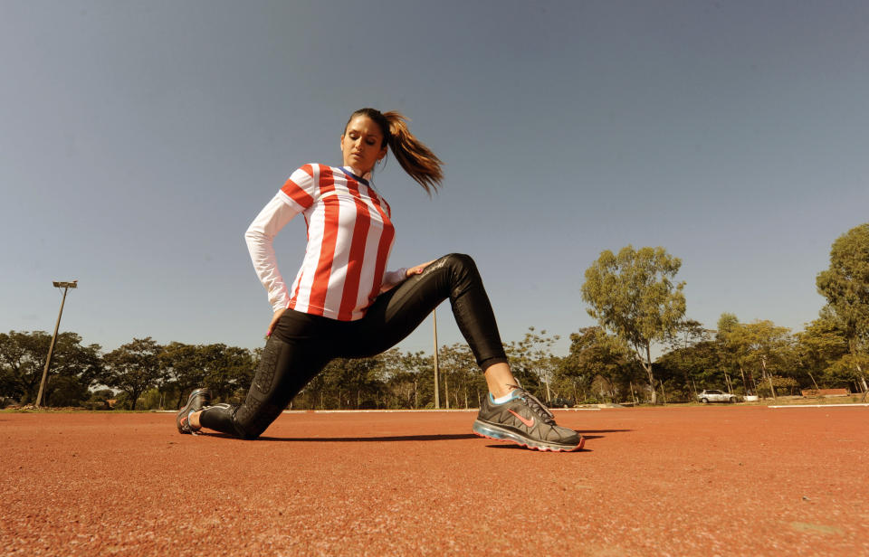 Leryn Franco, member of the Paraguayan Olympic javelin team and model, takes part in a practice ahead of the London 2012 Olympic Games, in Asuncion on July 19, 2012. Franco's beauty was a media sensation during the Beijing 2008 Olympic Games. (Norberto Duarte/AFP/Getty Images)