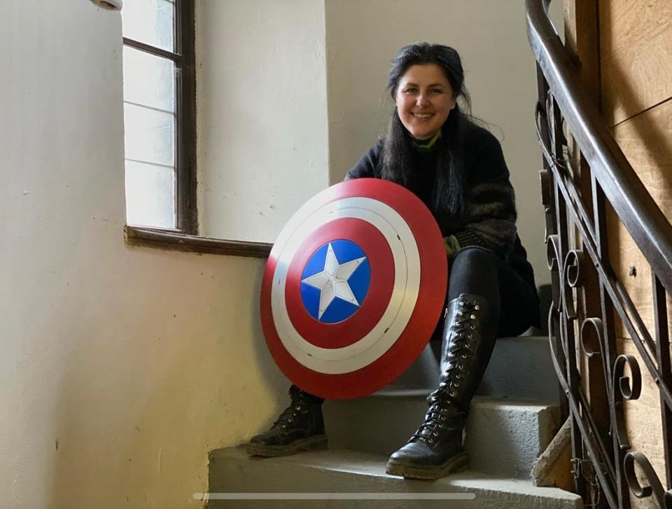 Actor Dani Deetté poses with Captain America's shield during filming of the Disney+ series, "The Falcon and Winter Soldier."