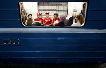 Soccer fans from Denmark are seen inside a metro at a subway station on the second day of the 2018 FIFA World Cup in Moscow, Russia, June 15, 2018. REUTERS/Christian Hartmann