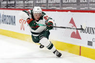 FILE - Minnesota Wild left wing Kirill Kaprizov (97) plays in the first period during an NHL hockey game against the Arizona Coyotes in Glendale, Ariz., in this Friday, March 5, 2021, file photo. After waiting five years for Kirill Kaprizov to leave Russia for the NHL, the Minnesota Wild's level of satisfaction with their floppy-haired, easy-smiling left wing has met the extraordinary expectations that surrounded his debut season. (AP Photo/Rick Scuteri, File)