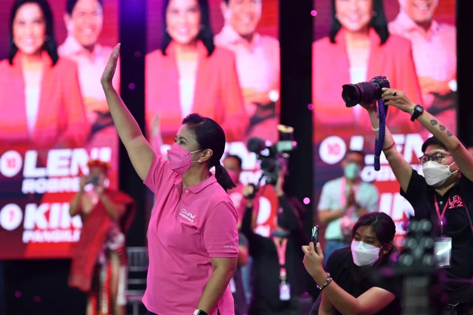 Philippines&#39; Vice President and opposition presidential candidate Leni Robredo greets supporters during a campaign rally in the business district of Pasig city, suburban Manila on March 20, 2022. (Photo by Ted ALJIBE / AFP) (Photo by TED ALJIBE/AFP via Getty Images)