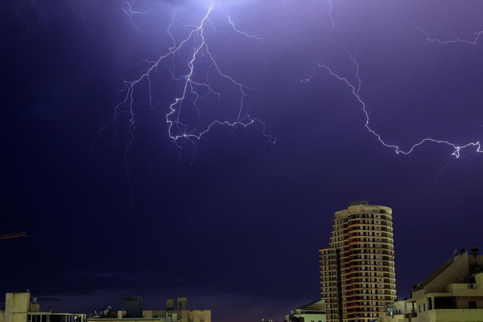 Lightning strikes the sky above the Israeli coastal city of Netanya, on June 13, 2023. (Photo by JACK GUEZ / AFP) (Photo by JACK GUEZ/AFP via Getty Images)