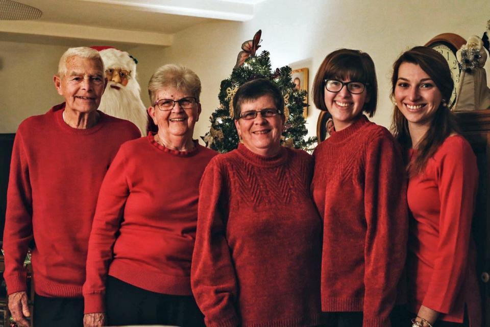 Johnette “Inky” Eckstine poses with her family for a photo in front of the Christmas tree in 2017. They are, from left, husband Dave Eckstine, Inky, longtime friend Bobbi Baker  and granddaughters Sarah and Julia Eckstine.