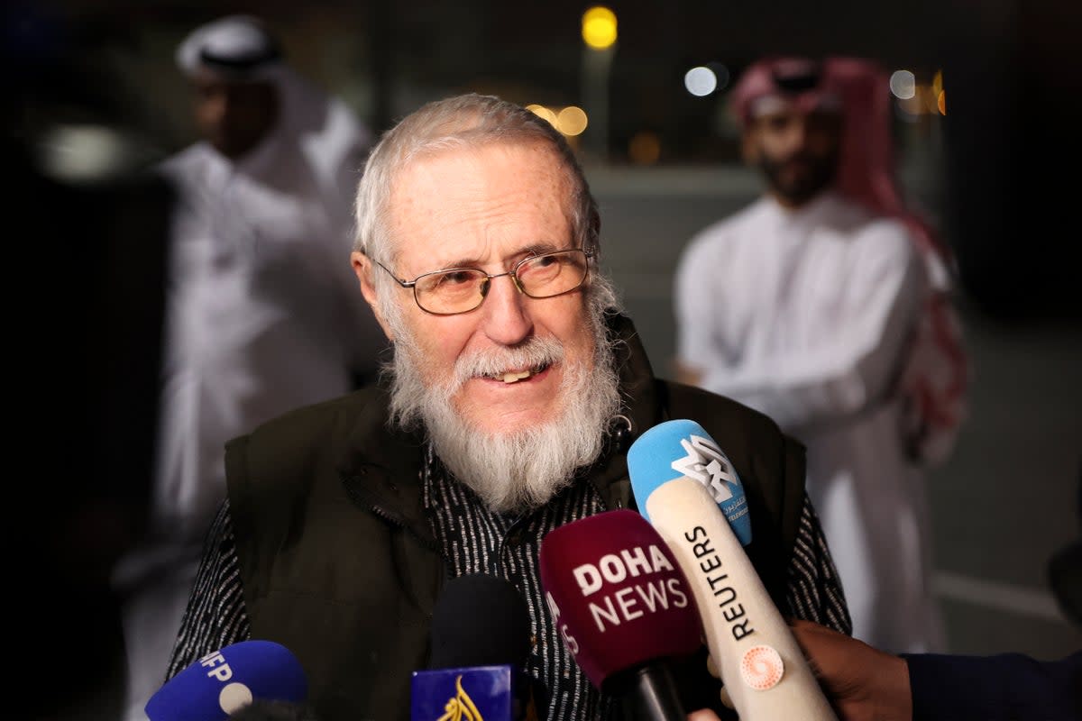 Austrian far-right activist Herbert Fitz talks to the press on his arrival at Doha International Airport following his release from Taliban captivity  (AFP via Getty Images)