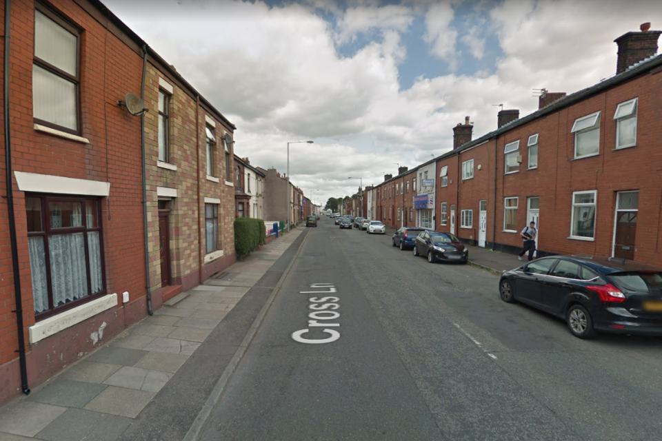 A one-year-old girl was found injured on Cross Lane in Radcliffe, she later died in hospital: Google Streetview