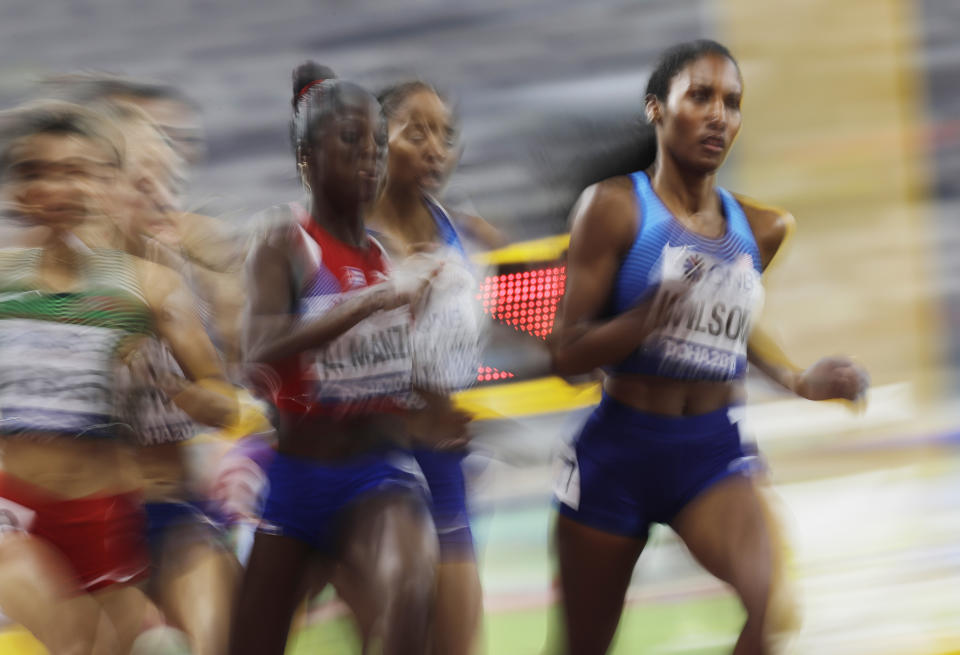 Ajee Wilson, of the United States, leads a the women's 800 meter semifinal at the World Athletics Championships in Doha, Qatar, Saturday, Sept. 28, 2019. (AP Photo/Petr David Josek)