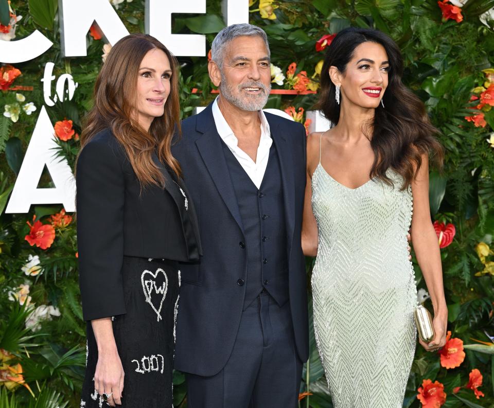 LONDON, ENGLAND - SEPTEMBER 07: (L-R) Julia Roberts, Amal Clooney and George Clooney attend the "Ticket To Paradise" World Premiere at Odeon Luxe Leicester Square on September 07, 2022 in London, England. (Photo by Karwai Tang/WireImage)