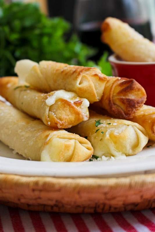 <p>The Two Bite Club</p><p>Air fryer wonton mozzarella sticks are a healthy alternative to fried mozzarella sticks at just 100 calories each!</p><p><strong>Get the recipe: <a href="https://www.thetwobiteclub.com/2020/02/air-fryer-wonton-mozzarella-sticks.html" rel="nofollow noopener" target="_blank" data-ylk="slk:Air Fryer Wonton Mozzarella Sticks;elm:context_link;itc:0;sec:content-canvas" class="link ">Air Fryer Wonton Mozzarella Sticks</a></strong></p>