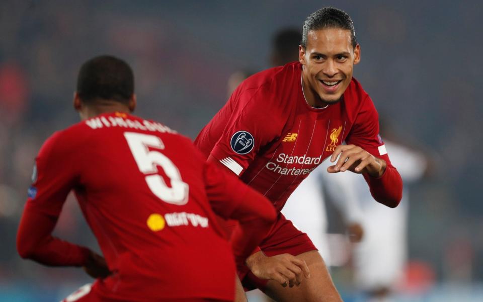 Georginio Wijnaldum celebrates scoring Liverpool's first goal with team-mate Virgil van Dijk - Action Images via Reuters