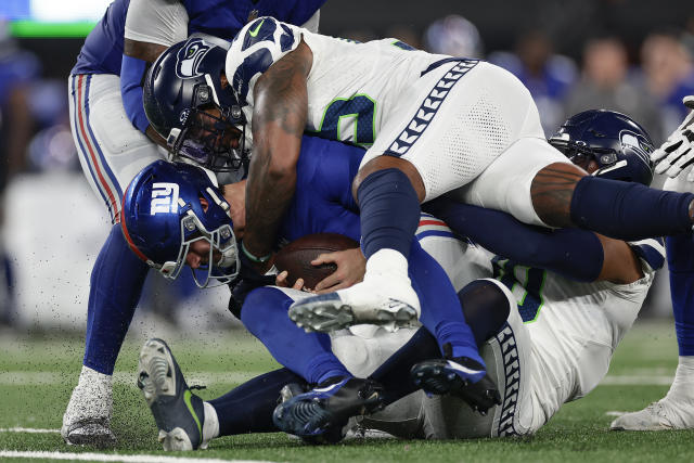 Devon Witherspoon returns interception 97 yards for TD as Seahawks blast  Giants, Daniel Jones