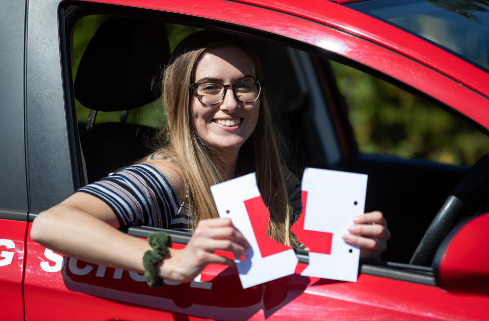 <p>Jade Bone, 24, celebrates passing her driving test at a test centre in Southampton, Hampshire, where examinations have resumed under the latest easing of lockdown restrictions. Driving tests have been suspended throughout the UK since early January but restart in England and Wales today. Picture date: Thursday April 22, 2021.</p>
