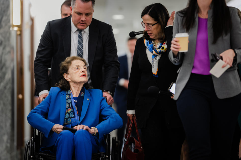 Senator Dianne Feinstein looks very vulnerable and stares at the ceiling as Prowda speaks to her.