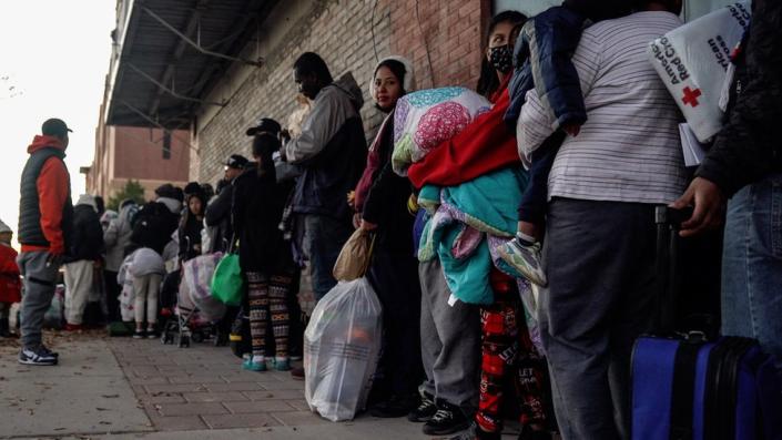 A line of migrants seeking food and shelter in El Paso, Texas