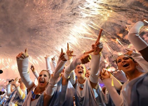 Performers celebrate at the end of the closing ceremony of the 2012 London Olympic Games at the Olympic stadium in London. The London Olympics lost its first medallist to a doping scandal on Monday as Belarus shot-putter Nadezhda Ostapchuk was stripped of gold a day after the Games closed in a blaze of music and colour