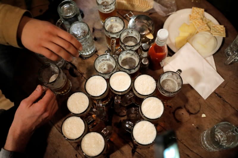 FILE PHOTO: A final round of ales sit on a table at McSorley's Old Ale House, which, established in 1854, is referred to as New York City's oldest Irish saloon and was ordered to close at 8:00pm as part of a city-wide order