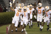 Tennessee's Henry To'o To'o (11), Trevon Flowers (1), Deandre Johnson (13) and Kenneth George Jr. (5) celebrate an interception return for a touchdown against South Carolina during the first half of an NCAA college football game Saturday, Sept. 26, 2020, in Columbia, S.C. (AP Photo/Sean Rayford)