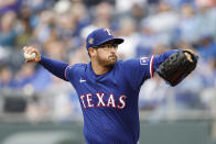 Texas Rangers pitcher Dane Dunning delivers to a Kansas City Royals batter during the first inning of a baseball game in Kansas City, Mo., Saturday, May 4, 2024. (AP Photo/Colin E. Braley)