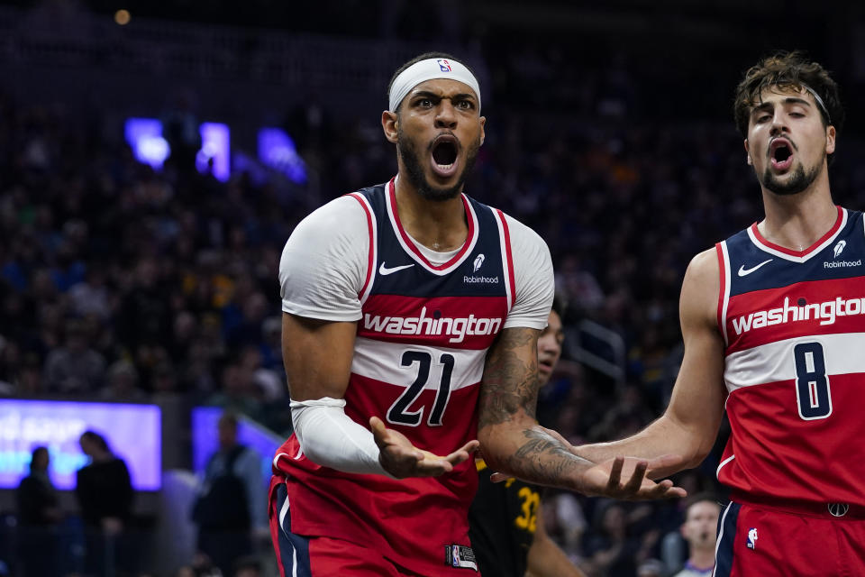 Washington Wizards center Daniel Gafford (21) reacts during the first half of the team's NBA basketball game against the Golden State Warriors, Friday, Dec. 22, 2023, in San Francisco. (AP Photo/Godofredo A. Vásquez)