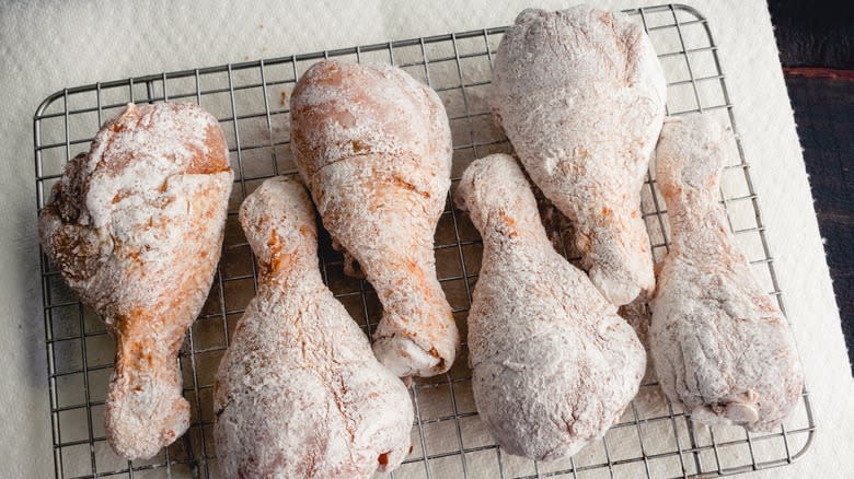 Battered chicken on wire rack