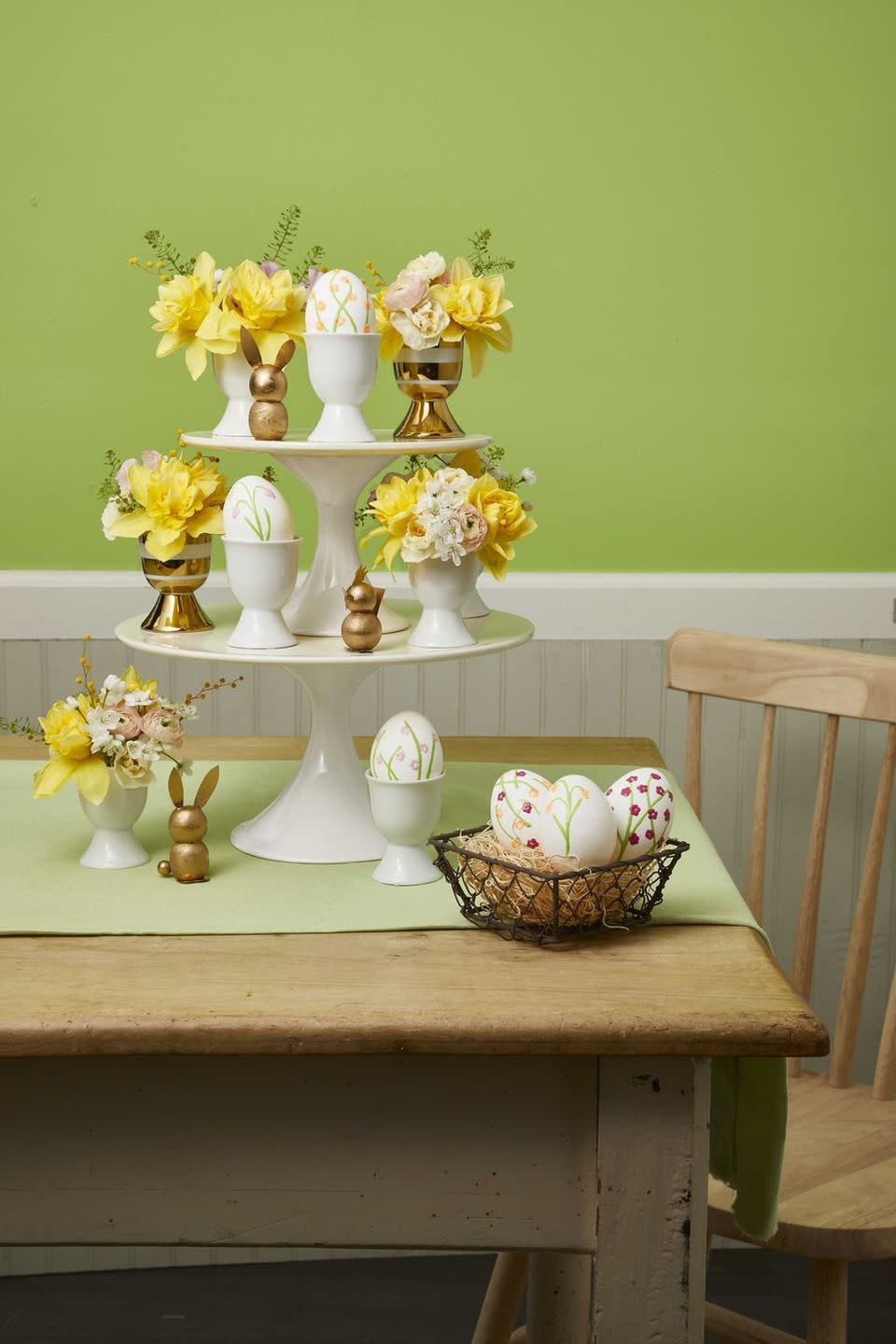 <p>After the kids decorate their Easter eggs, show them off with this elegant DIY cake stand.</p><p><strong><em><a href="https://www.womansday.com/home/decorating/g1100/easter-brunch/?slide=1" rel="nofollow noopener" target="_blank" data-ylk="slk:Get the Cake Stand tutorial;elm:context_link;itc:0;sec:content-canvas" class="link ">Get the Cake Stand tutorial</a>.</em></strong></p><p><strong><a class="link " href="https://www.amazon.com/VILAVITA-Cupcake-Dessert-Birthday-Celebration/dp/B074TF6YB4?tag=syn-yahoo-20&ascsubtag=%5Bartid%7C10070.g.1751%5Bsrc%7Cyahoo-us" rel="nofollow noopener" target="_blank" data-ylk="slk:SHOP CAKE STANDS;elm:context_link;itc:0;sec:content-canvas">SHOP CAKE STANDS</a></strong></p>