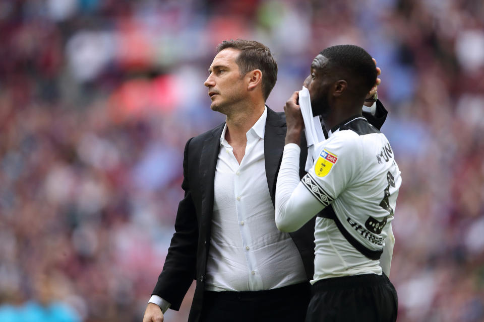 Frank Lampard consoles Fikayo Tomori following defeat at Wembley (Photo by Matthew Ashton - AMA/Getty Images)