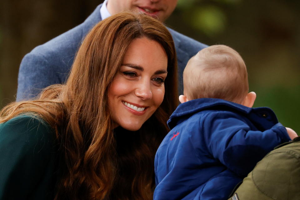 EDINBURGH, SCOTLAND - MAY 27: Catherine, Duchess of Cambridge smiles at baby Penelope Stewart during a visit to Starbank Park on May 26, 2021 in Edinburgh, Scotland. (Photo by Phil Noble - WPA Pool/Getty Images)