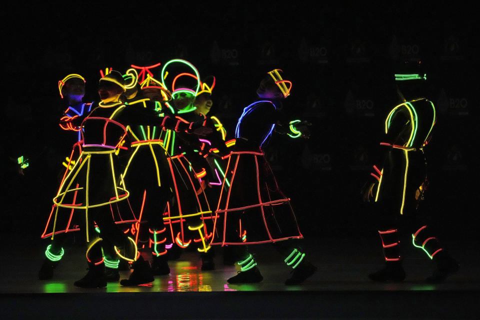 Dancers perform during the opening of the B20 Summit ahead of the G20 leaders summit in Nusa Dua, Bali, Indonesia, Sunday, Nov. 13, 2022. (AP Photo/Achmad Ibrahim)