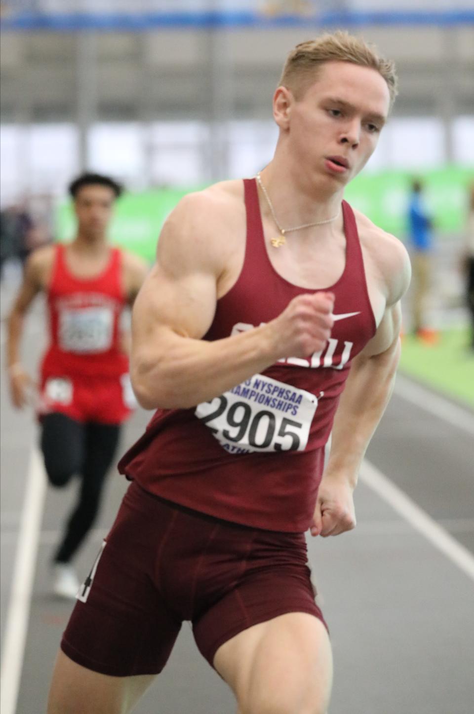 Jadon Spain from James O'Neil competes in the boys 300 meter dash during the New York State Indoor Track and Field Championships, at the Ocean Breeze Athletic Complex on Staten Island, March 4, 2023. 