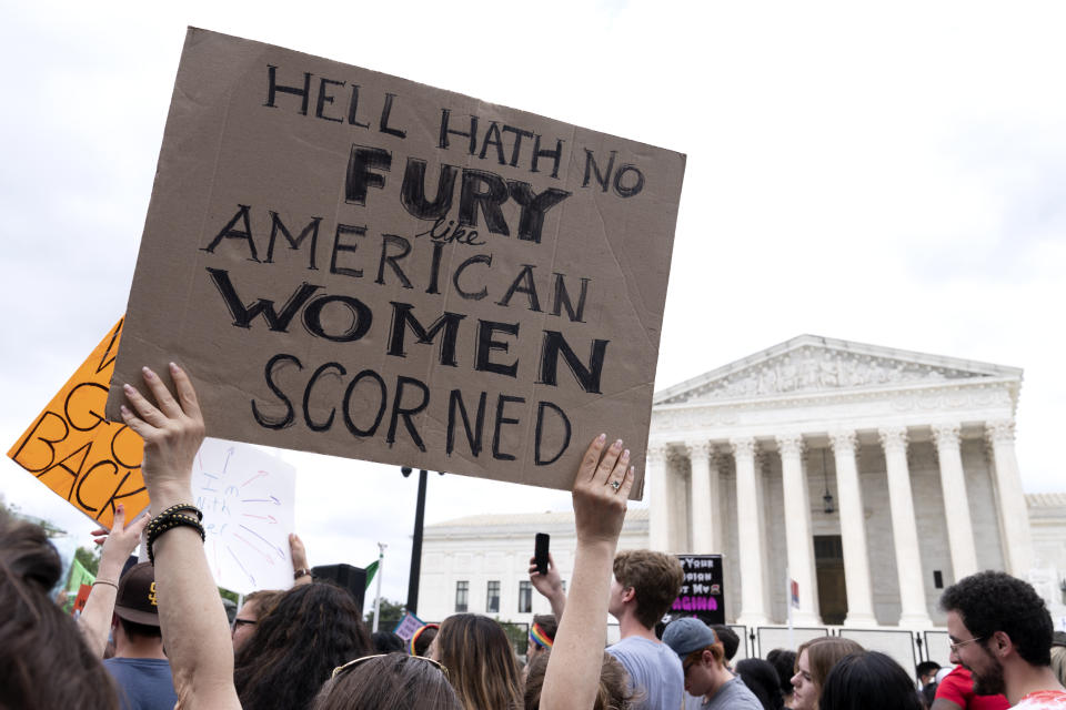 FILE - People protest following the Supreme Court's decision to overturn Roe v. Wade in Washington, June 24, 2022. Democrats are pumping an unprecedented amount of money into advertising related to abortion rights, underscoring how central the message is to the party in the final weeks before the November midterm elections. (AP Photo/Jacquelyn Martin, File)