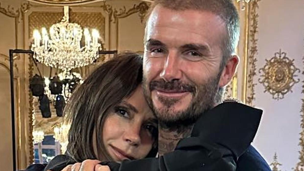 David and Victoria Beckham hugging