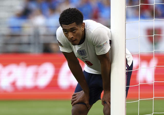 England’s Jude Bellingham reacts by leaning forward near the goal net