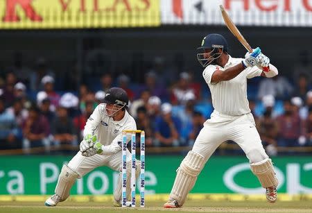 Cricket - India v New Zealand - Third Test cricket match - Holkar Cricket Stadium, Indore, India - 08/10/2016. India's Cheteshwar Pujara plays a shot. REUTERS/Danish Siddiqui