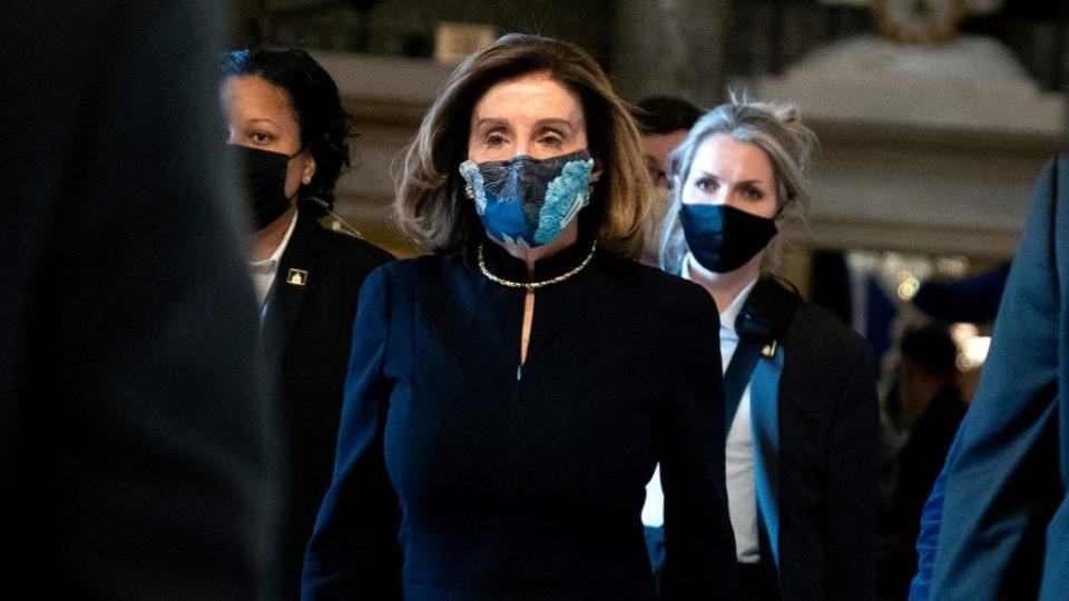 Speaker of the House Nancy Pelosi (center) walks to the House Floor during a vote on the impeachment of President Donald Trump at the U.S. Capitol Wednesday. (Photo by Stefani Reynolds/Getty Images)