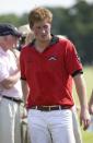 At a charity polo match in 2009 Prince Harry threw on a red and black polo shirt and kept his hair looking rugged.