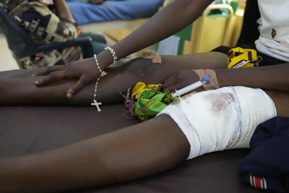 People involved in the St. Francis Catholic Church attack receives treatment at St Louis Catholic Hospital in Owo Nigeria, Monday, June 6, 2022. Lawmakers in southwestern Nigeria say more than 50 people are feared dead after gunmen opened fire and detonated explosives at a church. Ogunmolasuyi Oluwole with the Ondo State House of Assembly said the gunmen targeted the St Francis Catholic Church in Ondo state on Sunday morning just as the worshippers gathered for the weekly Mass. (AP Photo/Sunday Alamba)