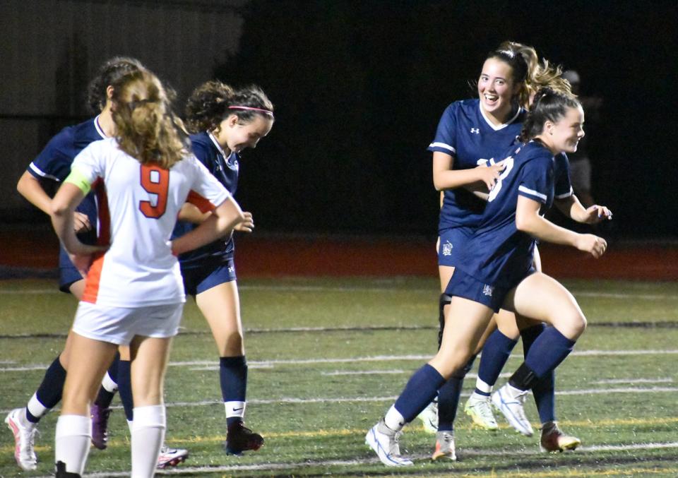 Somerset Berkley celebrates a goal by Mia Gentile in the second half of Wednesday's game against Diman at Somerset Berkley Regional High School. The Raiders won, 4-0.