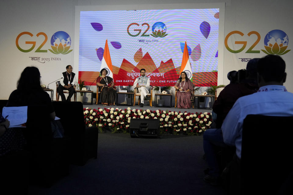 India's minister for information and broadcasting Anurag Thakur, second right, speaks during a press conference after addressing the delegates at the Finance and Central Bank Deputies (FCBD) meeting at G20 conclave in Bengaluru, India, Wednesday, Feb. 22, 2023. Top financial leaders from the Group of 20 leading economies are gathering in the south Indian technology hub of Bengaluru to tackle challenges to global growth and stability. India is hosting the G-20 financial conclave for the first time in 20 years. (AP Photo/Aijaz Rahi)