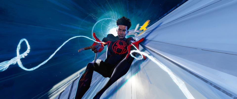 Miles Morales (Shameik Moore) spins webs in "Spider-Man: Across the Spider-verse (Part One)."