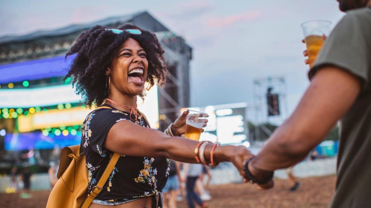 couple having a good time at a music festival