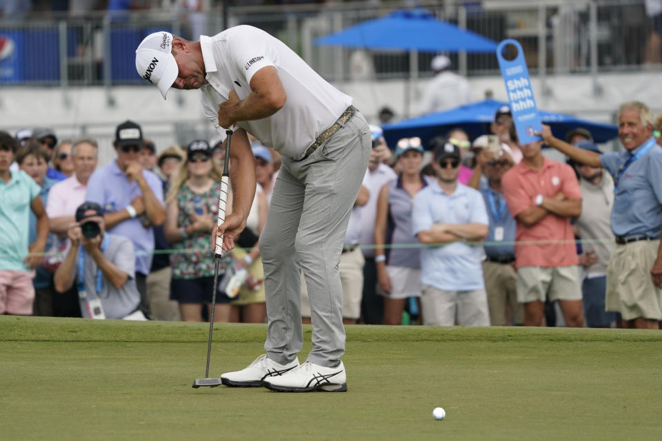 Lucas Glover putts on the ninth hole during the final round of the Wyndham Championship golf tournament in Greensboro, N.C., Sunday, Aug. 6, 2023. (AP Photo/Chuck Burton)