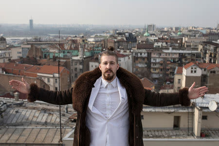 Student and 2017 presidential candidate Luka Maksimovic, 25, poses for a picture as his alter ego 'Ljubisa "Beli" Preletacevic' a parody of the worst politician in the Balkans,in Belgrade, Serbia, March 14, 2017. Picture taken March 14. REUTERS/Marko Djurica