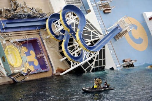 Military rescuers patrol next to the Costa Concordia. Costa Crociere, the owner of the luxury liner that ran aground off the coast of Italy, killing at least five people, said on Sunday its captain had made "errors of judgment"